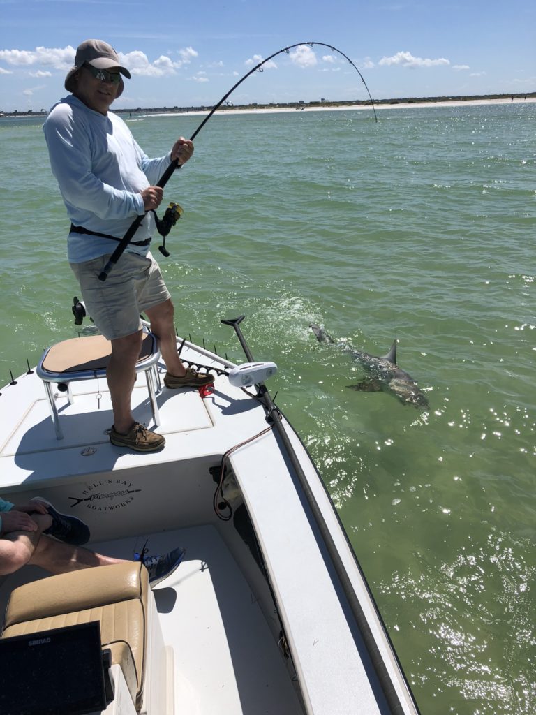 Tampa Fly Fishing Guide man on a boat fishing